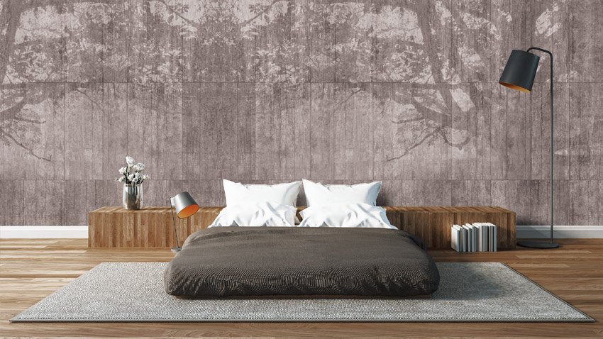 Arredamento con parete effetto cemento