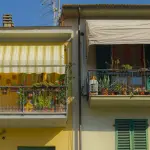 Coperture per il balcone: guida tecnica 2026